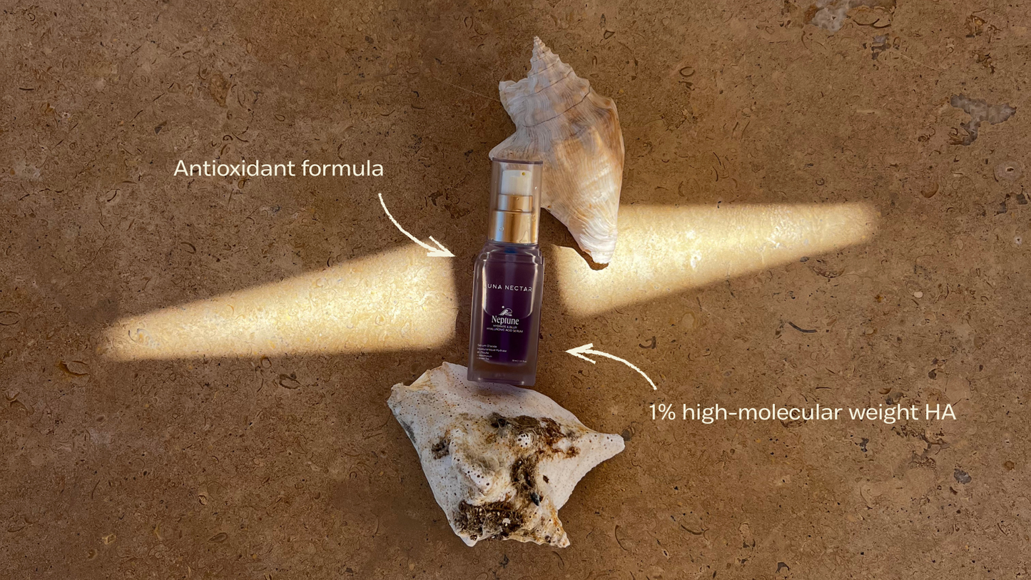 Luna Nectar Neptune Hydrate & Blur Serum bottle showing 1% high-molecular weight HA and antioxidant formula.