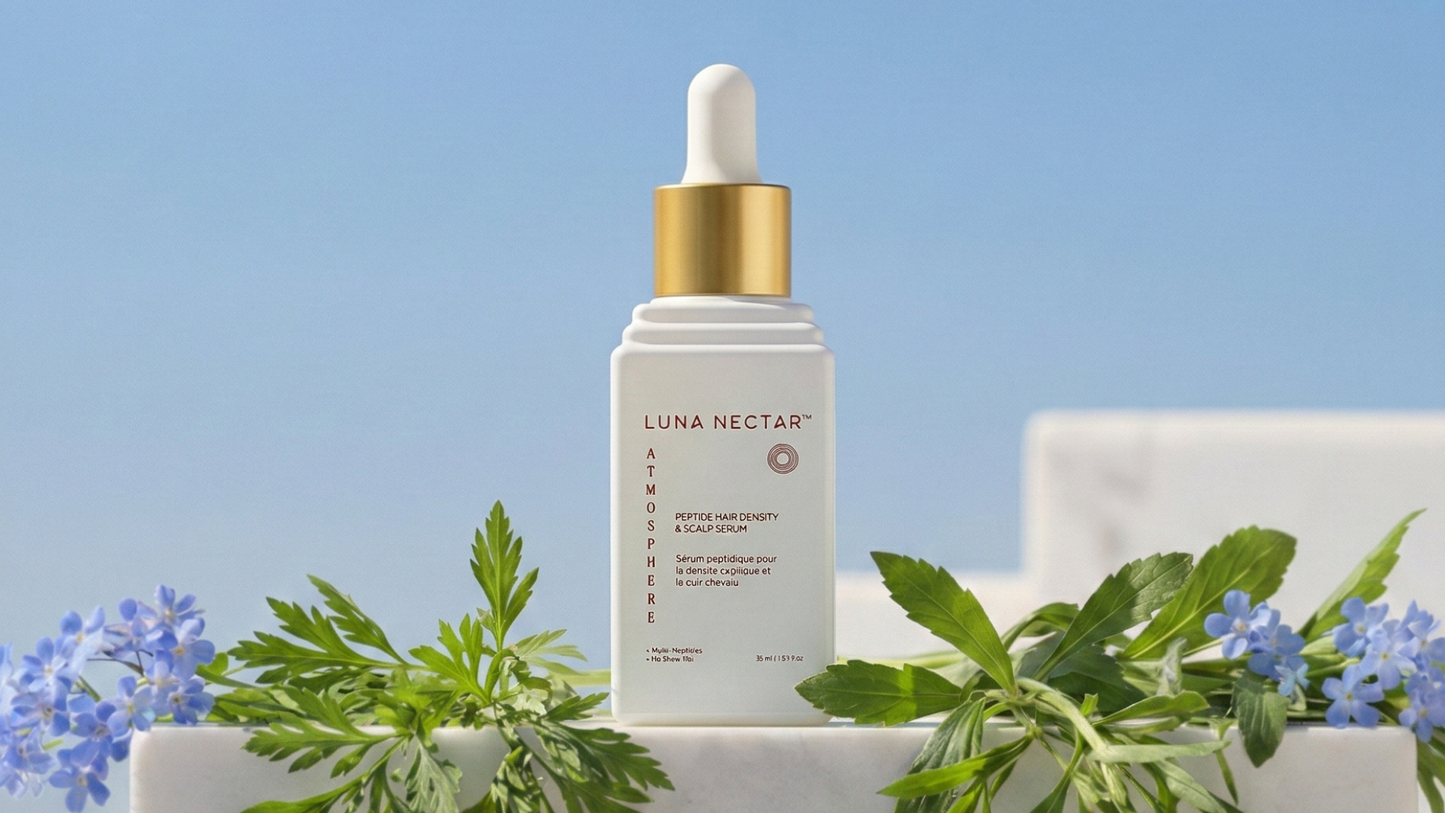 hair density serum with botanical ingredients and peptides displayed alongside natural herbs